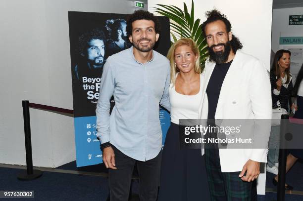 Omar Samra, Fleur Castle and Omar Nour attend 'Beyond the Raging Sea - Film Screening And Panel Conference' at Palais des Festivals on May 12, 2018...