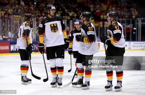 Oliver Mebus of Germany talks to his team mates during the 2018 IIHF Ice Hockey World Championship Group B game between Latvia and Germany at Jyske...