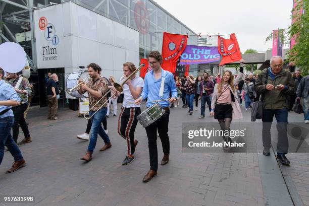 The Kansas Smitty's play whilst leading the procession from the National Theatre to The Old Vic to celebrate The Old Vic's 200th birthday on May 12,...