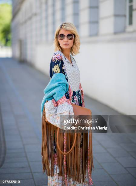 Gitta Banko wearing a long Boho dress by Perseverance London, turquoise turn-over half-sleeve scarf by Blondwalk 4 a cuckoo moment, multi-colored...