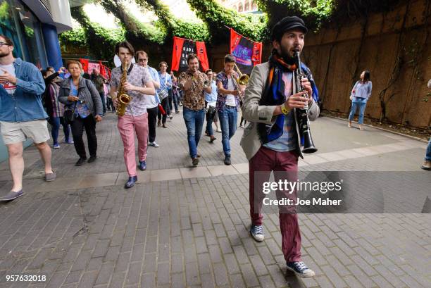 The Kansas Smitty's play whilst leading the procession from the National Theatre to The Old Vic to celebrate The Old Vic's 200th birthday on May 12,...