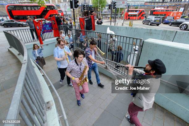 The Kansas Smitty's play whilst leading the procession from the National Theatre to The Old Vic to celebrate The Old Vic's 200th birthday on May 12,...