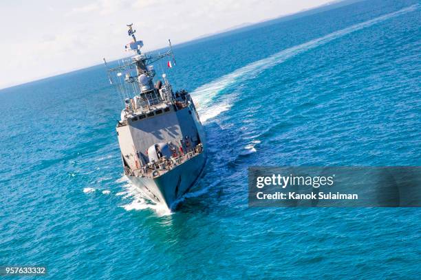 military navy ships in a sea bay view from helicopter - battleship stock pictures, royalty-free photos & images