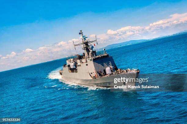 military navy ships in a sea bay view from helicopter - schlachtschiff stock-fotos und bilder