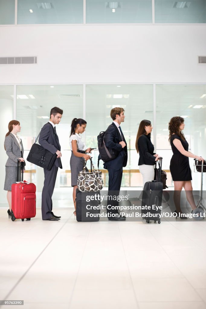 People in airport lineup