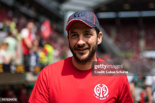 Head Coach Sandro Schwarz of Mainz smiles prior to the Bundesliga match between 1. FSV Mainz 05 and SV Werder Bremen at Opel Arena on May 12, 2018 in...
