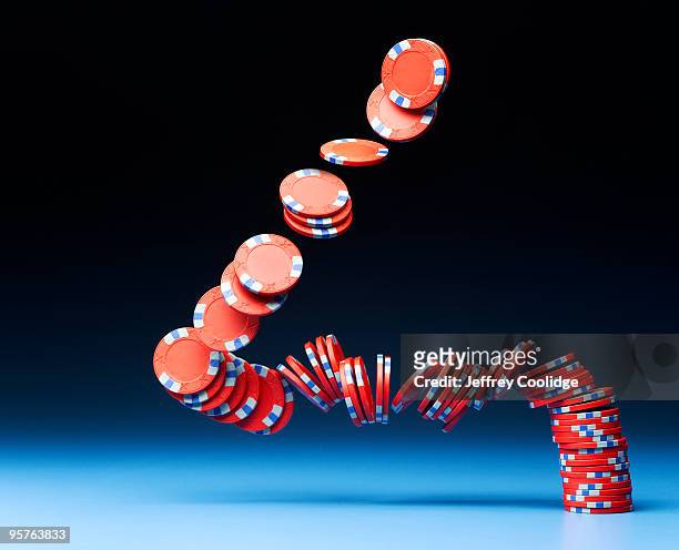 poker chips falling - gambling chip stock pictures, royalty-free photos & images