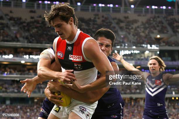 Bailey Banfield of the Dockers tackles Jack Steele of the Saints during the round eight AFL match between the Fremantle Dockers and the St Kilda...