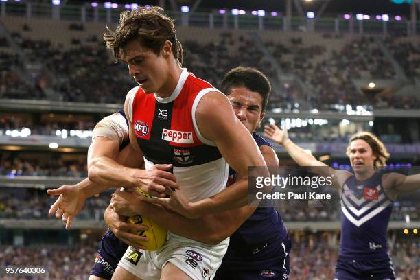 Bailey Banfield of the Dockers tackles Jack Steele of the Saints during the round eight AFL match between the Fremantle Dockers and the St Kilda...