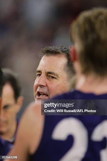 Ross Lyon, Senior Coach of the Dockers, addresses the players at the three quarter time break during the round eight AFL match between the Fremantle...