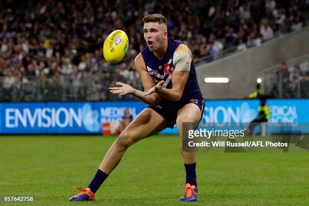 Luke Ryan of the Dockers marks the ball during the round eight AFL match between the Fremantle Dockers and the St Kilda Saints at Optus Stadium on...