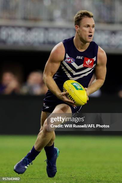 Brandon Matera of the Dockers looks to pass the ball during the round eight AFL match between the Fremantle Dockers and the St Kilda Saints at Optus...