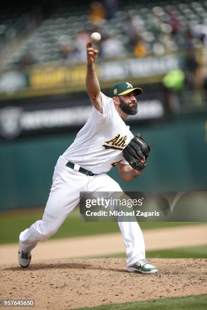 Chris Hatcher of the Oakland Athletics pitches during the game against the Chicago White Sox at the Oakland Alameda Coliseum on April 18, 2018 in...