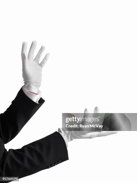 magician's hands gesturing - white glove stock-fotos und bilder