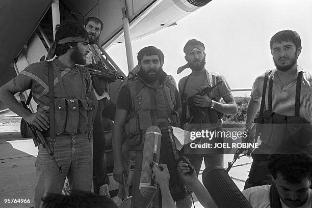 Five of the six heavy armed Lebanese Chi'ite Muslims who hijacked the Royal Jordanian Alia Boeing 727, 11 June 1985 at the Beirut airport pose for...