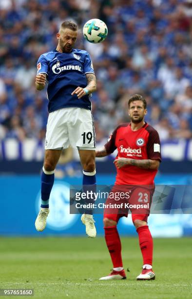 Guido Burgstaller of Schalke does a header during the Bundesliga match between FC Schalke 04 and Eintracht Frankfurt at Veltins-Arena on May 12, 2018...