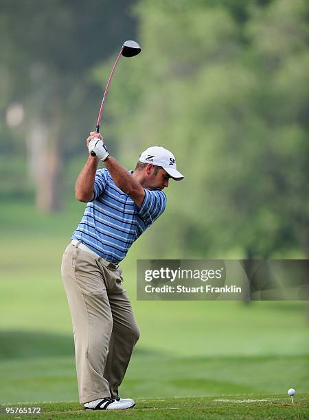 Hennie Otto of South Africa plays his tee shot during the first round of the Joburg Open at Royal Johannesburg and Kensington Golf Club on January...