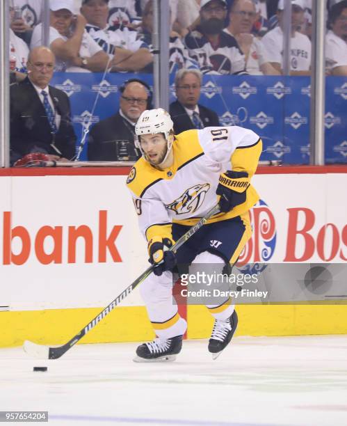 Calle Jarnkrok of the Nashville Predators plays the puck down the ice during first period action against the Winnipeg Jets in Game Six of the Western...