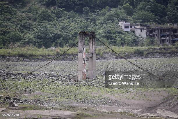 Destroyed bridge is seen at the ruins of earthquake-hit Beichuan county during the ten year anniversary on May 12, 2018 in Beichuan Qiang Autonomous...