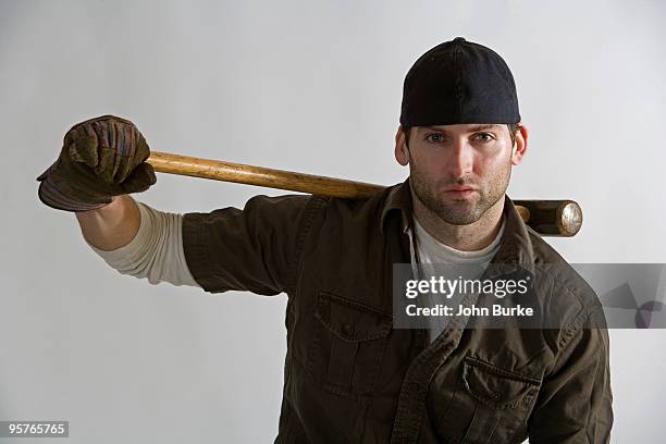 construction worker - construction worker sledge hammer stock pictures, royalty-free photos & images
