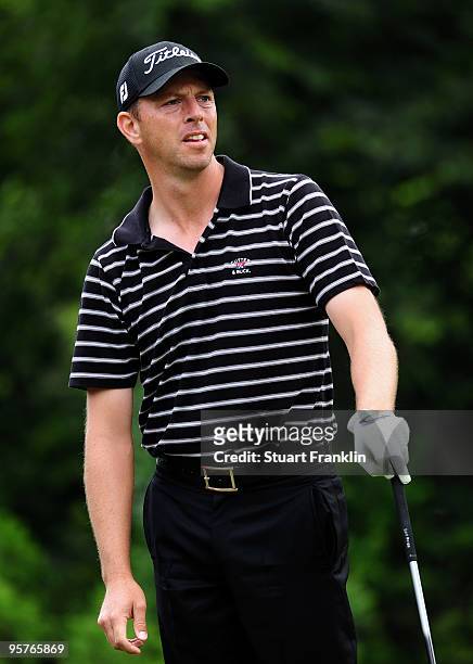 Soren Hansen of Denmark watches his tee shot during the first round of the Joburg Open at Royal Johannesburg and Kensington Golf Club on January 14,...