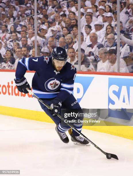 Ben Chiarot of the Winnipeg Jets plays the puck around the boards during second period action against the Nashville Predators in Game Six of the...