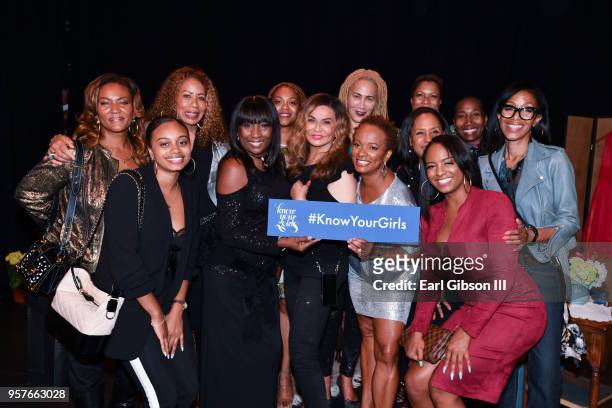 Women represent the Susan B. Komen 'Know Your Girls' pose for a photo KiKi Shepard, Tina Knowles and Vanessa Bell Calloway attend WACO Theater Center...