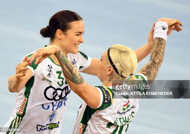 Anja Althaus and Yvette Broch of Hungarian Gyor Audi ETO celebrate their victory over Romanian CSM Bucuresti at the end of their semi-final match of...