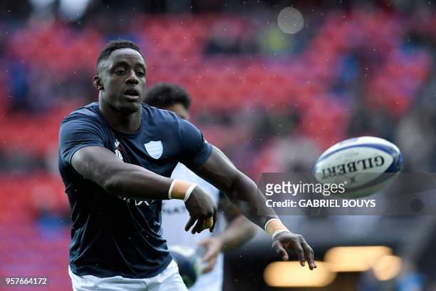 Racing 92's French number eight Yannick Nyanga warms up before the 2018 European Champions Cup final rugby union match between Racing 92 and Leinster...
