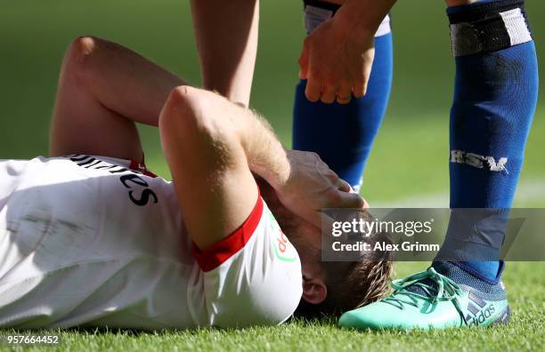 Aaron Hunt of Hamburger SV reacts after going down during the Bundesliga match between Hamburger SV and Borussia Moenchengladbach at Volksparkstadion...