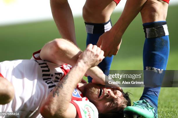 Aaron Hunt of Hamburger SV reacts after going down during the Bundesliga match between Hamburger SV and Borussia Moenchengladbach at Volksparkstadion...