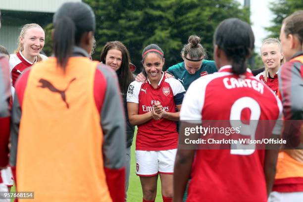 Alex Scott of Arsenal smiles in the team huddle after her last home game before retirement during the Womens Super League match between Arsenal...