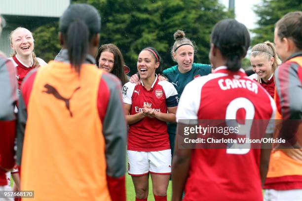 Alex Scott of Arsenal smiles in the team huddle after her last home game before retirement during the Womens Super League match between Arsenal...