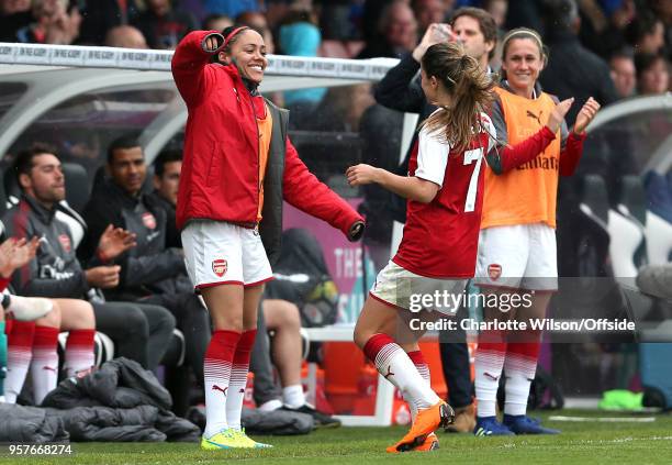 Danielle Van De Donk of Arsenal celebrates scoring their 1st goal with Alex Scott during the Womens Super League match between Arsenal Ladies and...