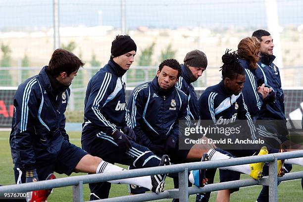 Real Madrid players Kaka, Cristiano Ronaldo, Marcelo, Guti and Royston Drenthe stretch during a training session at Valdebebas on January 14, 2010 in...