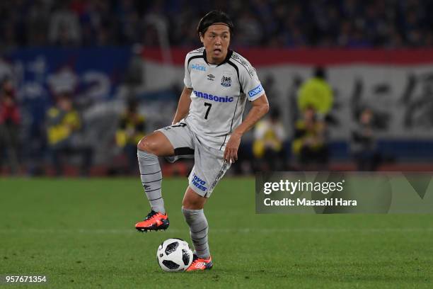 Yasuhito Endo of Gamba Osaka in action during the J.League J1 match between Yokohama F.Marinos and Gamba Osaka at Nissan Stadium on May 12, 2018 in...