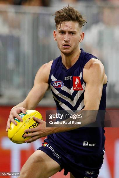 Taylin Duman of the Dockers looks to pass the ball during the round eight AFL match between the Fremantle Dockers and the St Kilda Saints at Optus...