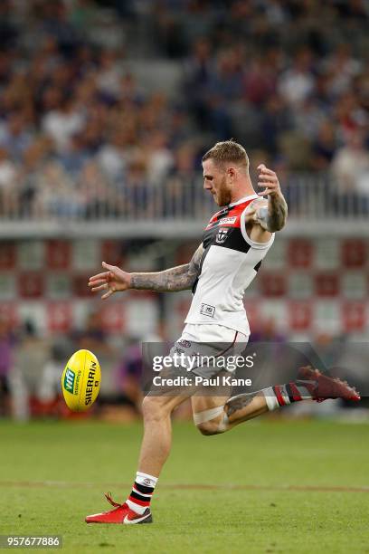 Tim Membrey of the Saints kicks on goal during the round eight AFL match between the Fremantle Dockers and the St Kilda Saints at Optus Stadium on...