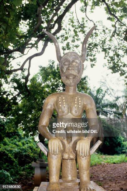 Legba created by the artist Cyprien Tokoudagba in the sacred forest of Ouidah. -