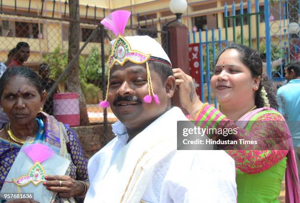 Couples get married in a mass wedding ceremony organized by Thane Shubmangal Samity Dharmadayi Santha and Ajikya Prathisthan at Bhartiya Sainik...