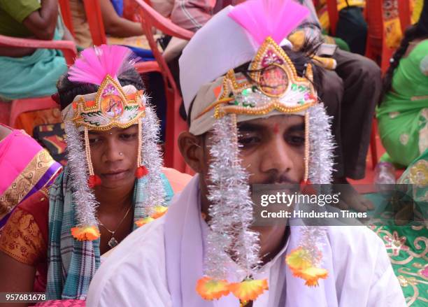 Couples get married in a mass wedding ceremony organized by Thane Shubmangal Samity Dharmadayi Santha and Ajikya Prathisthan at Bhartiya Sainik...