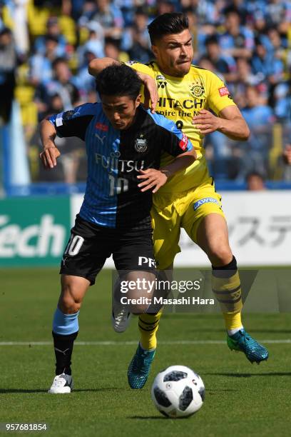 Cristiano of Kashiwa Reysol and Ryota Oshima of Kawasaki Frontale compete for the ball during the J.League J1 match between Kashiwa Reysol and...