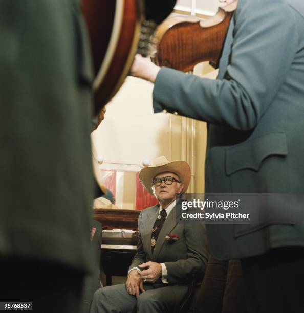 American bluegrass singer and mandolin player Bill Monroe backstage at the Hammersmith Odeon, London, 2nd May 1975.