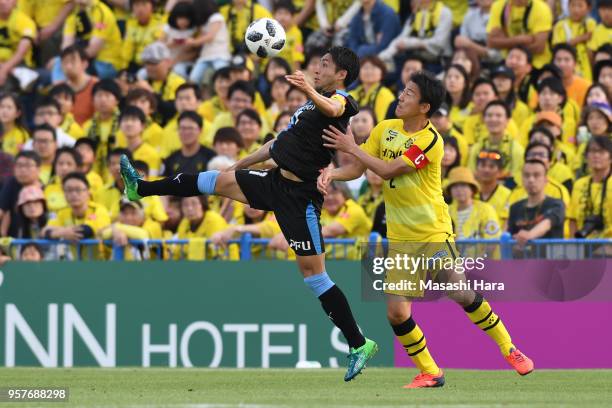 Yu Kobayashi of Kawasaki Frontale and Jiro Kamata of Kashiwa Reysol compete for the ball during the J.League J1 match between Kashiwa Reysol and...