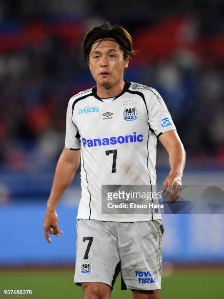 Yasuhito Endo of Gamba Osaka looks on during the J.League J1 match between Yokohama F.Marinos and Gamba Osaka at Nissan Stadium on May 12, 2018 in...
