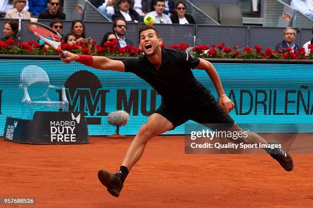 Dominic Thiem of Austria in action during his match against Kevin Anderson of South Africa during day eight of the Mutua Madrid Open at La Caja...