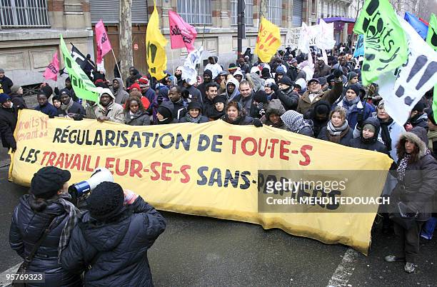 People protest during a demonstration called by association "Ministere de la Regularisation globale de tous les sans papiers" for the regularizing of...