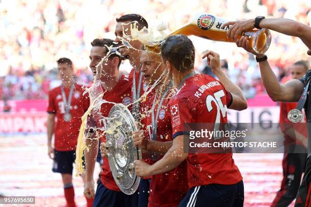 Bayern Munich's German midfielder Sebastian Rudy, forward Sandro Wagner, German midfielder Joshua Kimmich and German forward Thomas Mueller are...