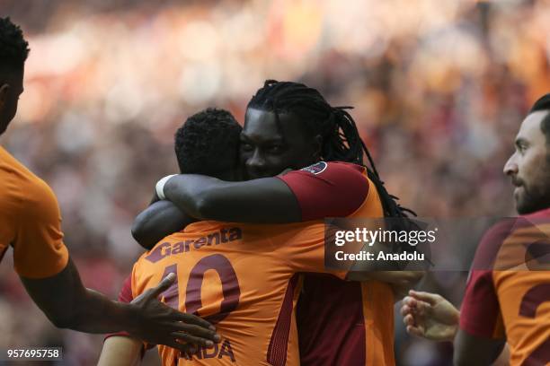 Younes Belhanda of Galatasaray celebrates his goal with Bafetibi Gomis during the Turkish Super Lig match between Galatasaray and Evkur Yeni...