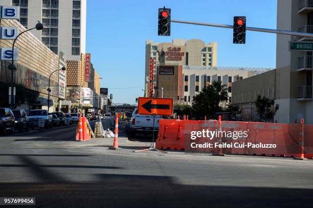 a road closer with arrow construction barrier at downtown las vegas, nevada, usa - las vegas street stock pictures, royalty-free photos & images